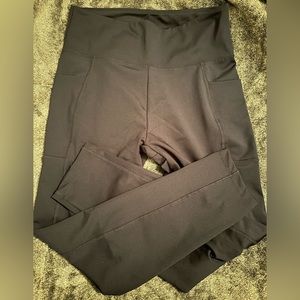 EUC Bally black leggings.  Side pockets.